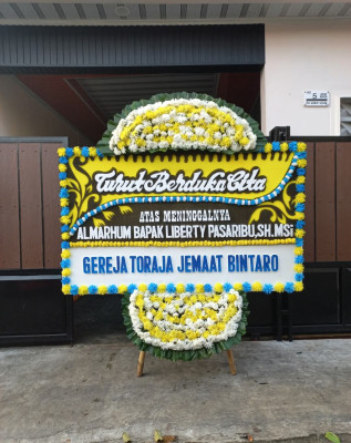 Papan Bunga Duka di Panjang